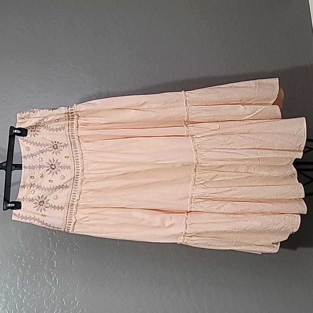 Free People light orange color. Size L